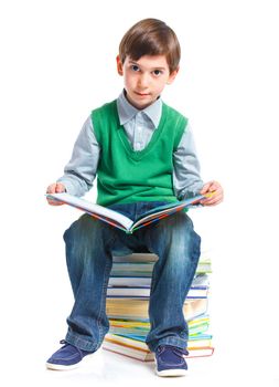 Education - funny boy with books. Isolated over white background.