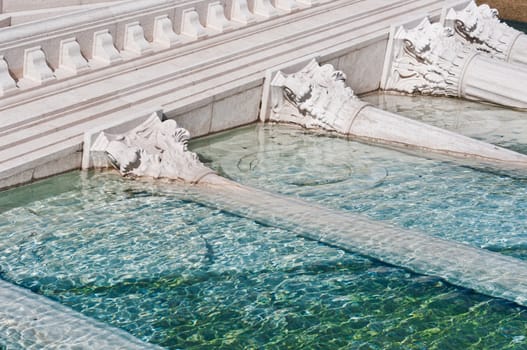 classic roman monument sunk in water