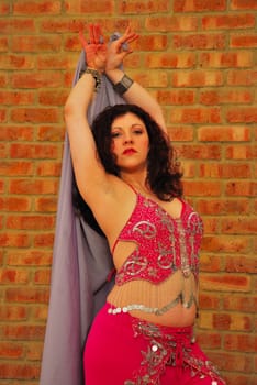 Belly Dancer with brick background