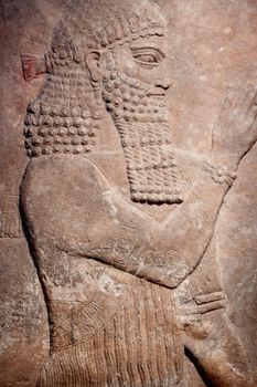 Ancient clay relief of an Sumer king