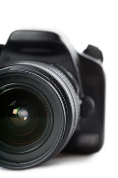 Modern digital SLR camera isolated over white background
