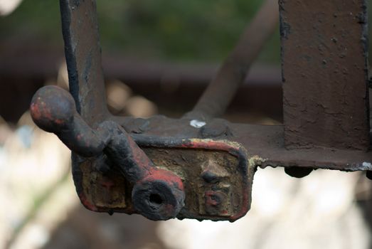 Coroded steel metal switch in rust isolated bokeh