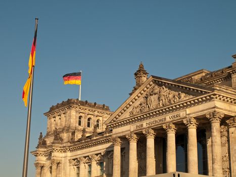 German Flag Flying over Reichstag Bundestag Building, Berlin Germany