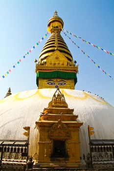 Stupa of the swayambhunath temple with blue sky in kathmandu, Nepal