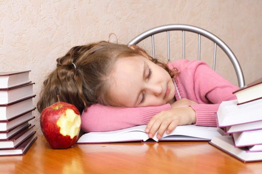 Smart girl reading a book and sleep