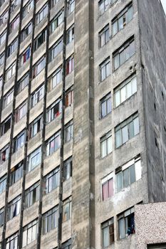 Facade of a rundown building in a poor neighborhood in the center of Sao Paulo, Brazil.