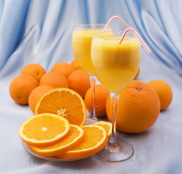 Crystal glasses of fresh orange juice