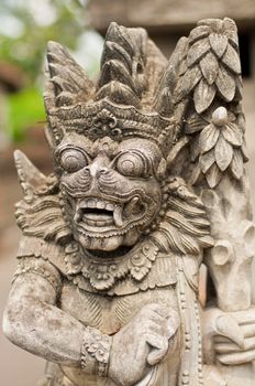 Statue of Balinese demon in Ubud, Indonesia