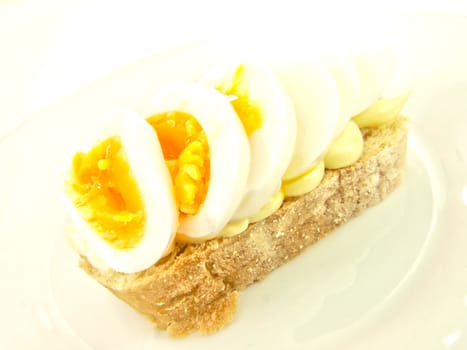 Soft boiled egg sandwich, ciabatta and mayonnaise