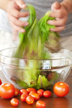man preparing salad