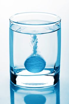 tablet in glass of water