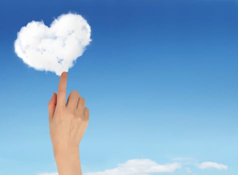 Hands holding heart shaped cloud and blue sky