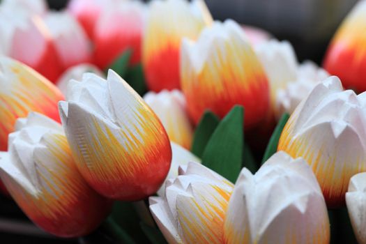 Image of colorful wooden tulips on a market stand in Amsterdam.