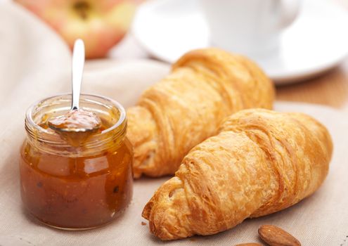 croissant with jam for breakfast
