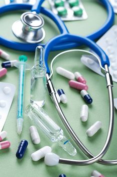stethoscope and pills