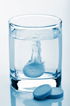 tablet in glass of water 