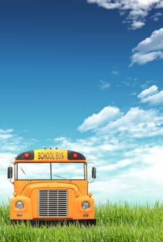 Green grass, blue sky and the school bus.