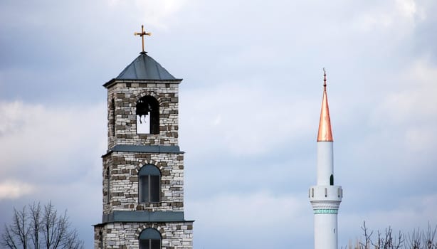 minaret and church dome in prespa,macedonia