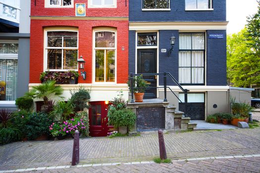 black and red painted houses in Amsterdam center