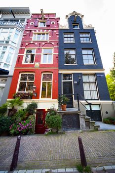 black and red painted houses in Amsterdam center