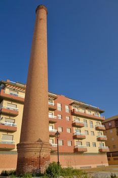 Broken chimneys on the west beach of Velez-malaga