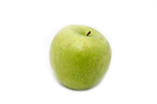 a large green apple on a white background