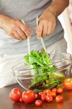 man preparing salad 
