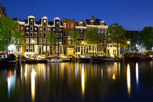lovely houses in Amsterdam center- photo taken in the late evening - star suggests long exposure time