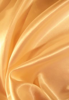 Smooth elegant golden satin as background