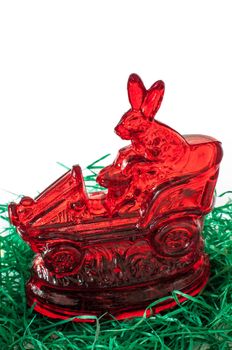 Sugar Easter bunny with car on grass with copy space