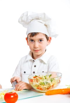 Little cook tasty salad, isolated on white. Vertical view