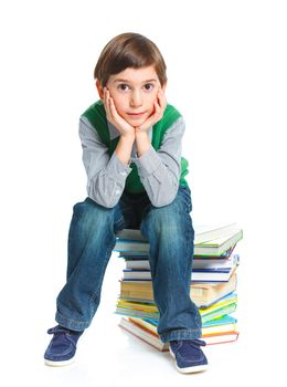 Education - funny boy with books. Isolated over white background.