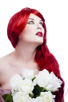 Attractive redhead woman, long red wavy hair with beautiful white roses