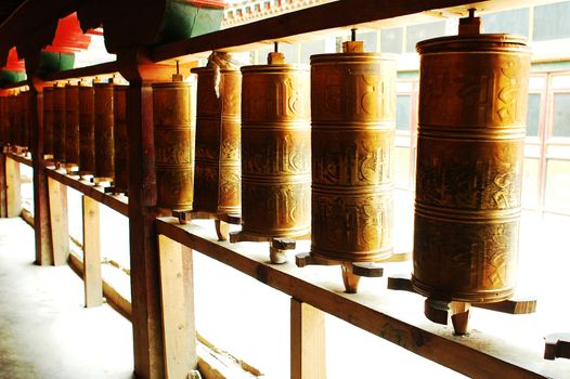 Tibetan prayer wheels in an ancient lamasery