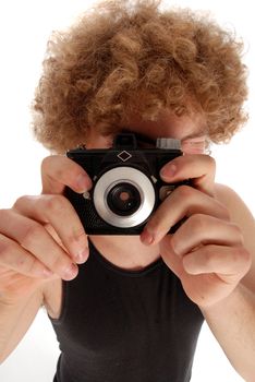 Young Man with Afro using Old Fshioned Camera