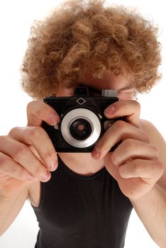 Young Man with Afro using Old Fshioned Camera