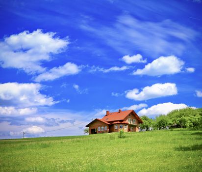 New house on cloudy sky