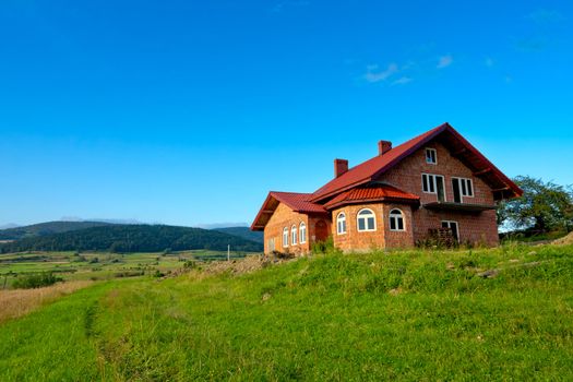 New house on blue sky