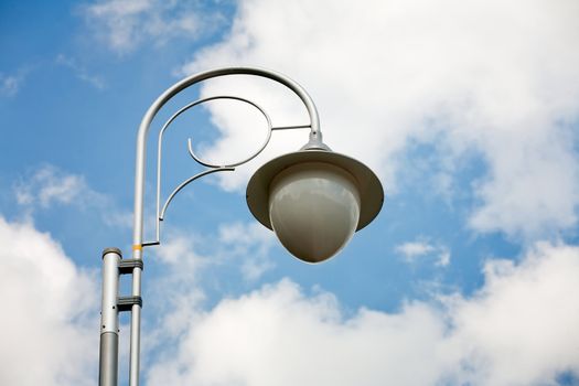 Street lamp on blue sky