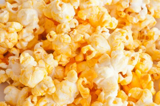 Salted popcorn grains closeup