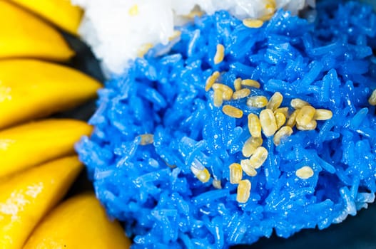 Thai style dessert, glutinous rice eat with mangoes