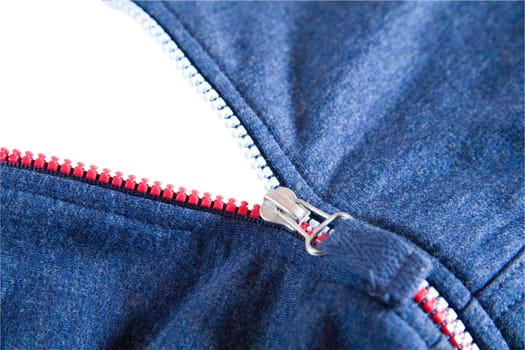 Zipper on fashionable and modern clothes of dark blue colour