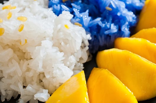 Thai style dessert, glutinous rice eat with mangoes