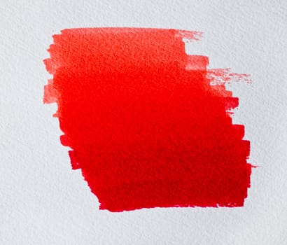 Brush red color on white paper