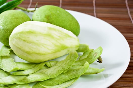 Mango fruit on white dish