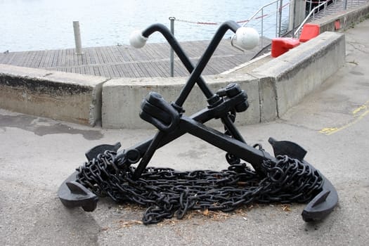 Anchors at a sea pier, a monument at the sea