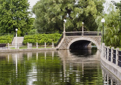 A small stone bridge on the Rideau canal in Ottawa, Canada during summer.