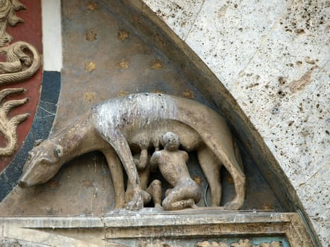 Siena - the town's emblem; a she-wolf suckling the infants Romulus and Remus.