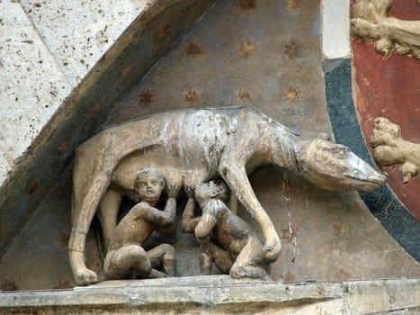 Siena - the town's emblem; a she-wolf suckling the infants Romulus and Remus.
