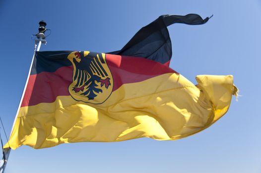 flag in front of blue sky